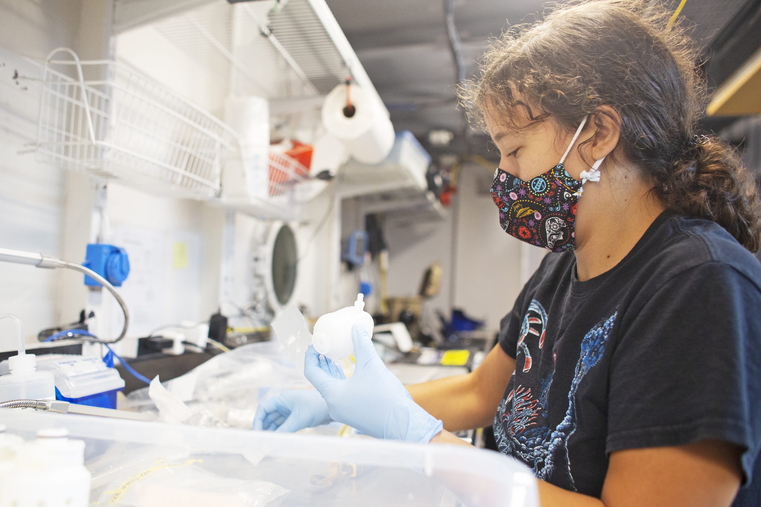 WHOI research assistant Erin Frates processes a batch of samples in the Wet Lab after a Mesobot dive on September 28, 2021. (Photo: OET/Nautilus Live)