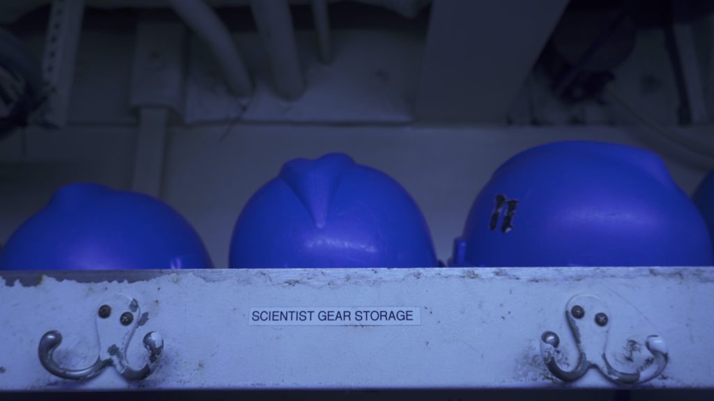 Hard hats are cleanly organized - for now. Science personnel and engineers aboard the Bigelow will wear these while working on deck. (Photo by Andrea Vale © Woods Hole Oceanographic Institution)
