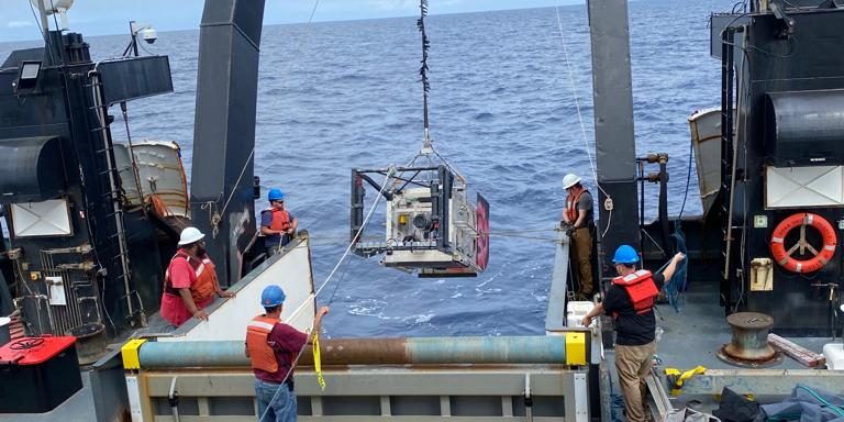 Deep-See is deployed from aboard the R/V Bigelow. While winch trouble has stalled full operations, the team has managed to push forward with modified deployments and manual effort. (Photo by Annette Govindarajan © Woods Hole Oceanograhic Institution)