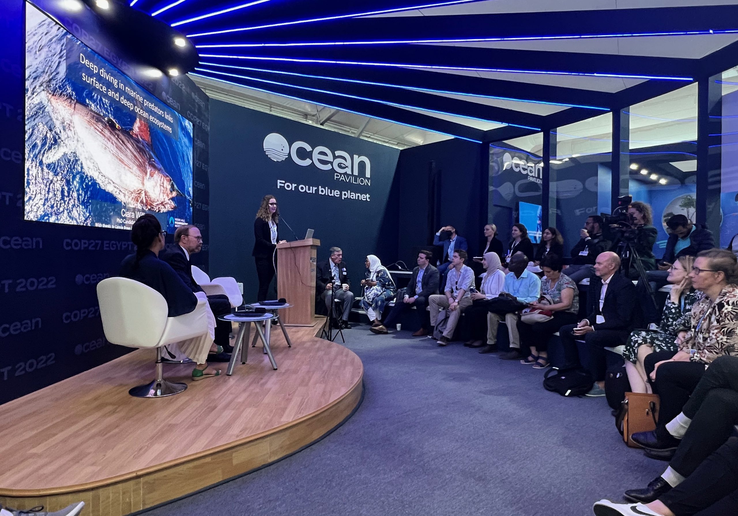 PhD student Ciara Willis presents research from the OTZ project at COP27's Ocean Pavilion.